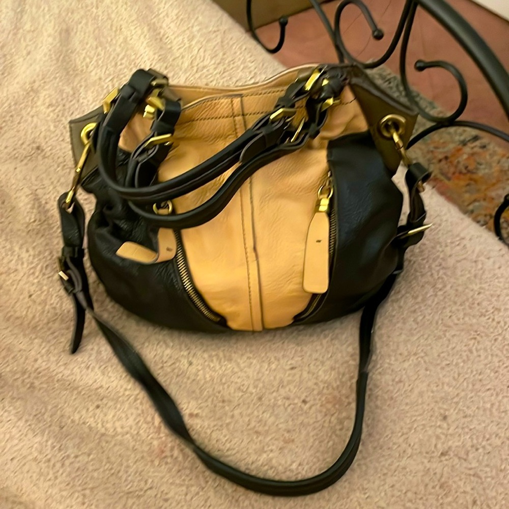 orYANY cream and black Tote with Handles and Shoulder Strap. Zipper detail